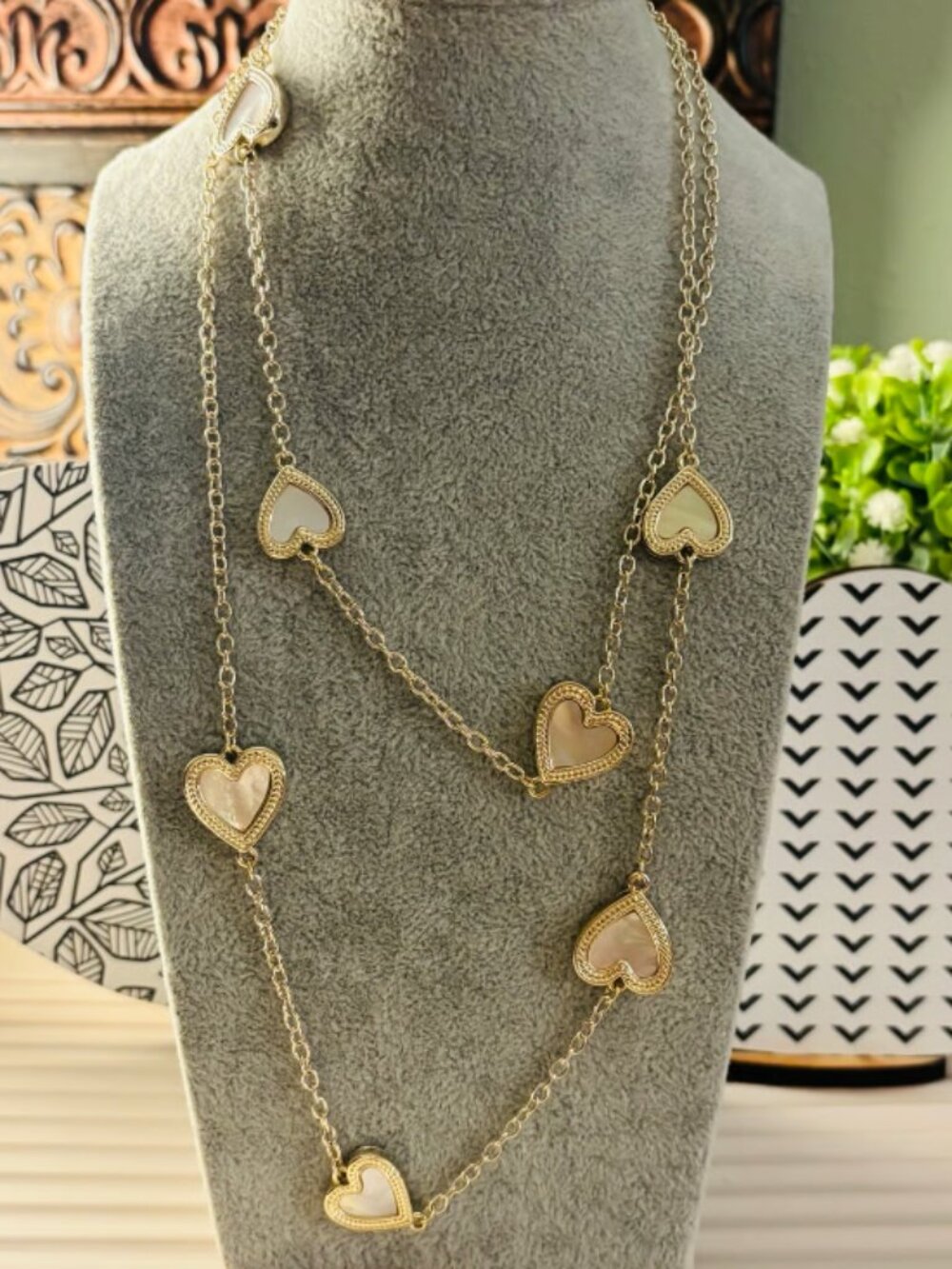 Gold tone mother of pearl heart necklace